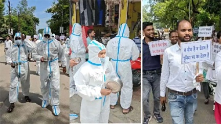 *NHM कर्मचारियों का अनोखा प्रदर्शन, PPE किट पहनकर बाजार में मांगी भीख*